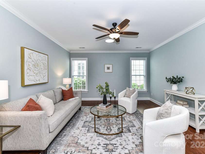 11123 Bailey Park Nature Drive, Cornelius, NC 28031.  MLS# CAR4247952, YatesRealty ID 18437. Great Room features crown molding & ceiling fan with light!