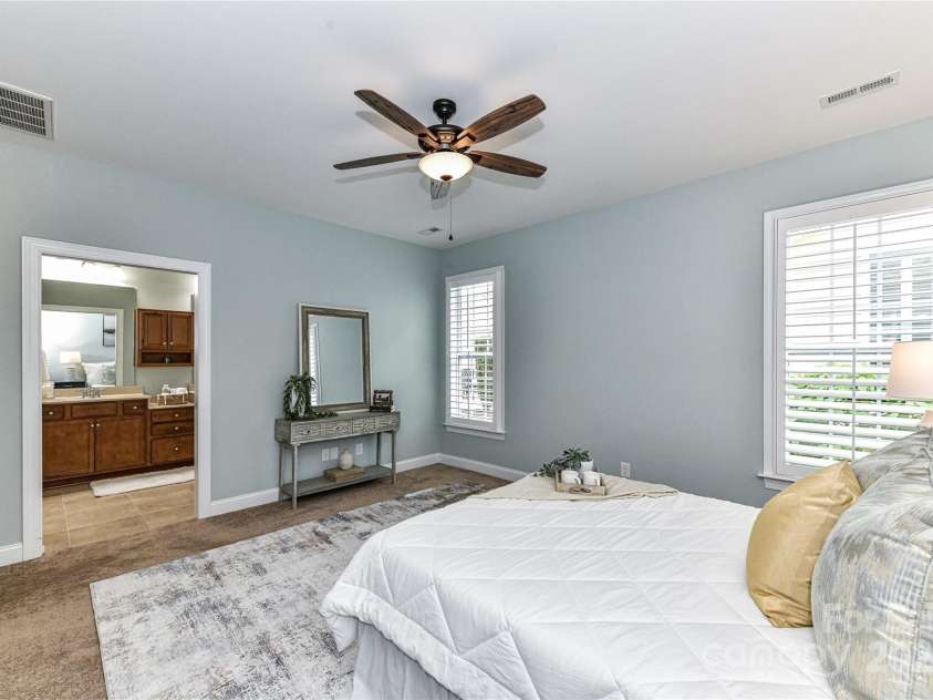 11123 Bailey Park Nature Drive, Cornelius, NC 28031.  MLS# CAR4247952, YatesRealty ID 18437. Spacious Primary Suite with ceiling fan/light, plantation shutters, private bath & walk in closet!