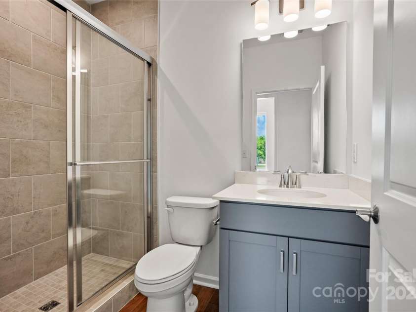 12009 Grinstead Lane, Charlotte, NC 28278.  MLS# CAR4268807, YatesRealty ID 18438. Bathroom to ensuite