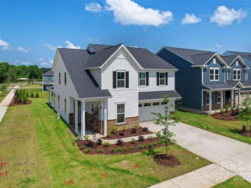 12009 Grinstead Lane, Charlotte, NC 28278.  MLS# CAR4268807, YatesRealty ID 18438. Exterior front corner