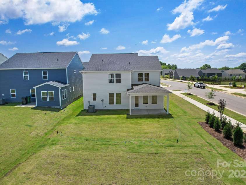 12009 Grinstead Lane, Charlotte, NC 28278.  MLS# CAR4268807, YatesRealty ID 18438. Rear yard view