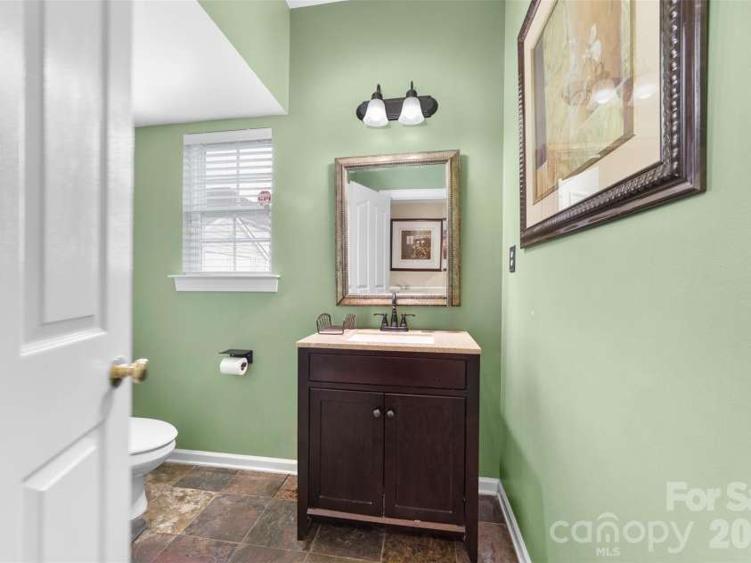 11019 Southfield Drive, Charlotte, NC 28273.  MLS# CAR4333684, YatesRealty ID 18439. First floor half bath