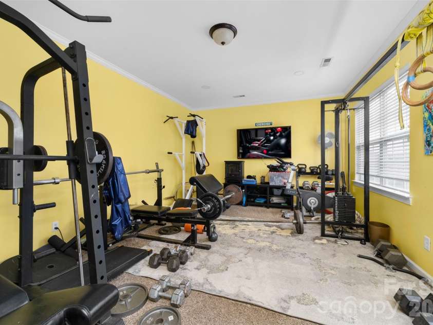 11019 Southfield Drive, Charlotte, NC 28273.  MLS# CAR4333684, YatesRealty ID 18439. First floor office, toy room, exercise room, guest bedroom