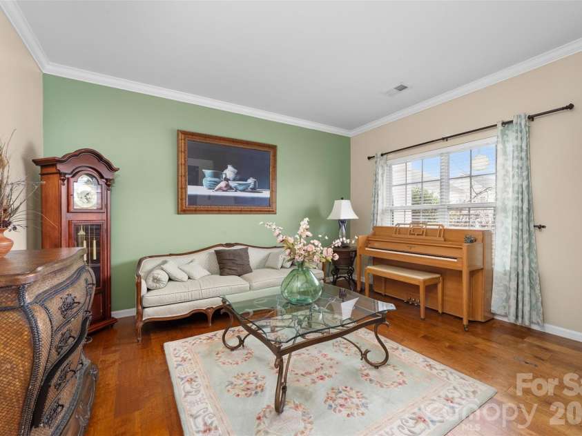 11019 Southfield Drive, Charlotte, NC 28273.  MLS# CAR4333684, YatesRealty ID 18439. Front music room, office, reading den the choices are endless