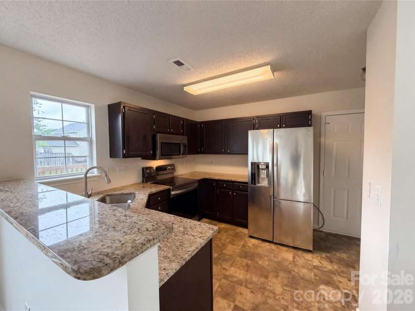 4975 Bentridge Drive, Concord, NC 28027.  MLS# CAR4376481, YatesRealty ID 18441. 