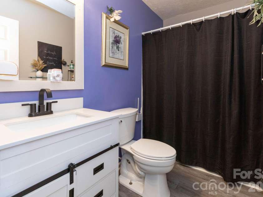 30 Compton Drive, Asheville, NC 28806.  MLS# CAR4363963, YatesRealty ID 18443. Hall Bathroom