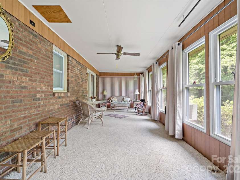 7050 US 70 Highway, Old Fort, NC 28762.  MLS# CAR4265680, YatesRealty ID 18445. Large Sunroom