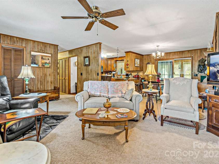 7050 US 70 Highway, Old Fort, NC 28762.  MLS# CAR4265680, YatesRealty ID 18445. Livingroom view to dining & Kitchen