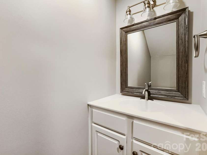 2937 Duvalla Avenue, Charlotte, NC 28209.  MLS# CAR4370499, YatesRealty ID 18447. Half Bath Lower Level