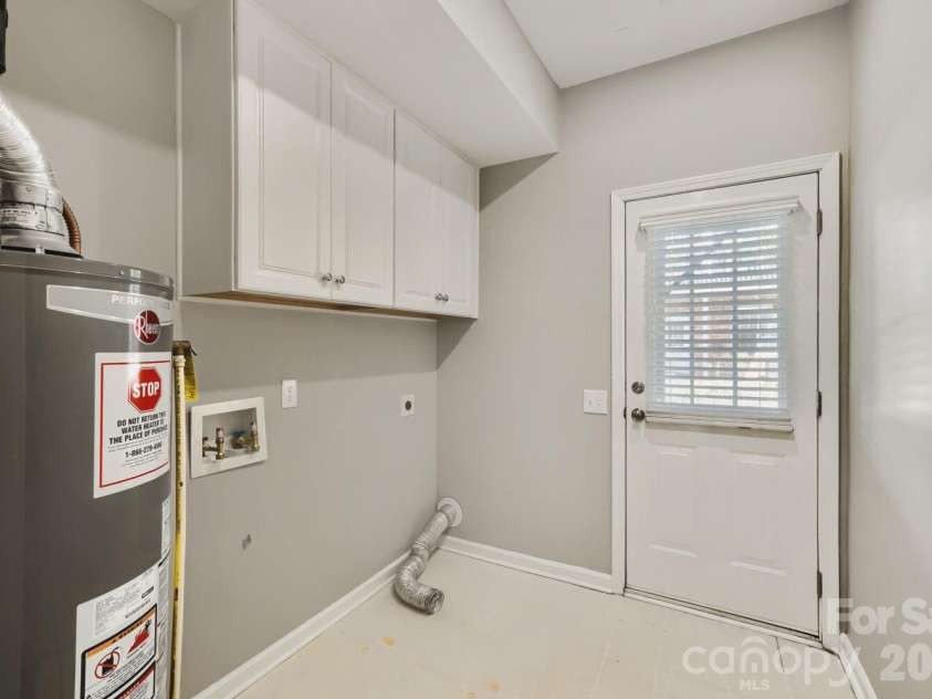 2937 Duvalla Avenue, Charlotte, NC 28209.  MLS# CAR4370499, YatesRealty ID 18447. Laundry Room Lower Level