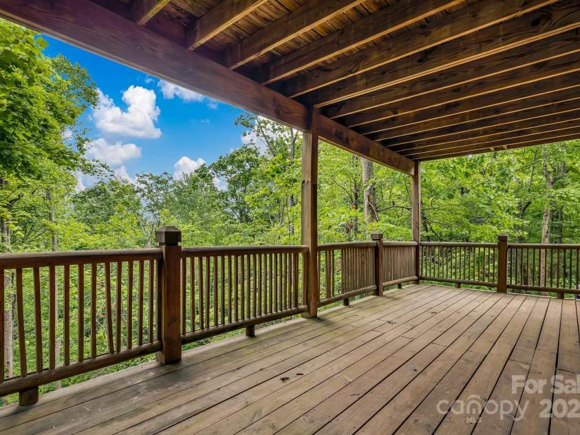 214 Laurel Mountain Trail, Saluda, NC 28773.  MLS# CAR4259688, YatesRealty ID 18449. All of the decks are covered so the wood stays protected from the elements.
