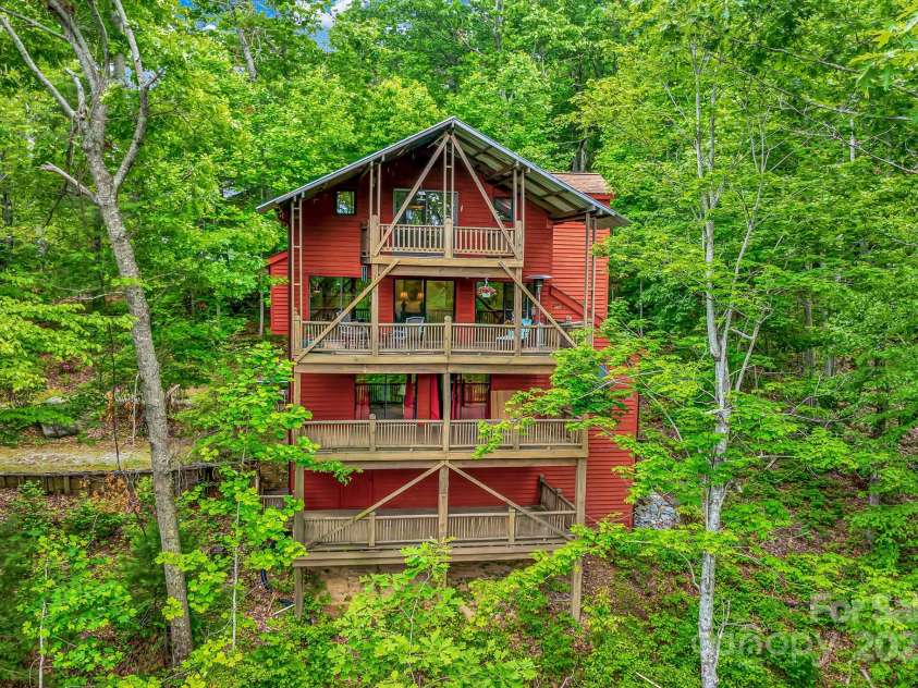 214 Laurel Mountain Trail, Saluda, NC 28773.  MLS# CAR4259688, YatesRealty ID 18449. Each of the four decks offers privacy and serenity.