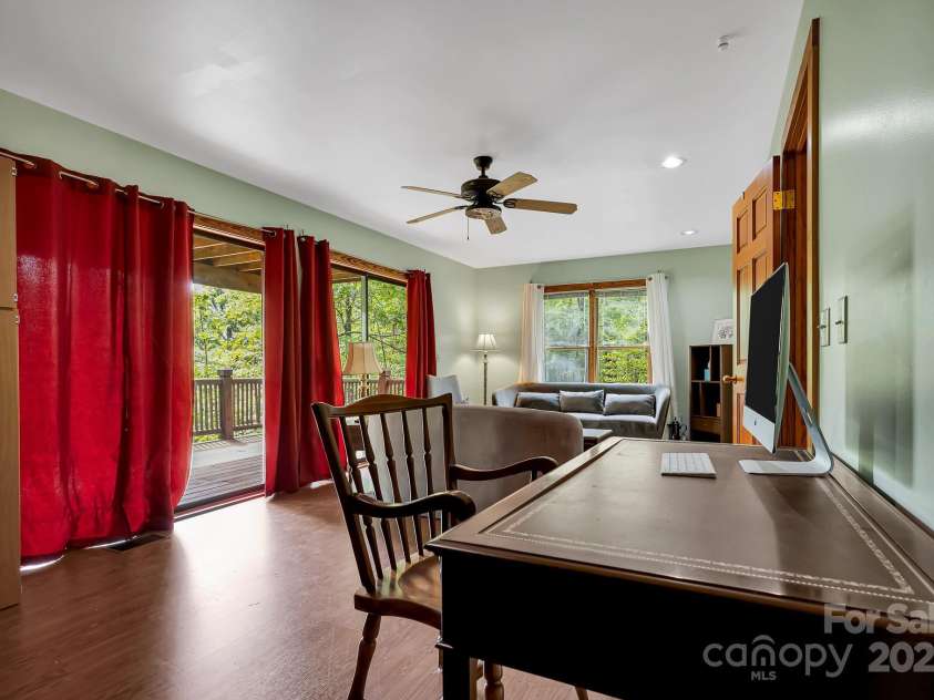 214 Laurel Mountain Trail, Saluda, NC 28773.  MLS# CAR4259688, YatesRealty ID 18449. First floor family room or bedroom, great space for guests.