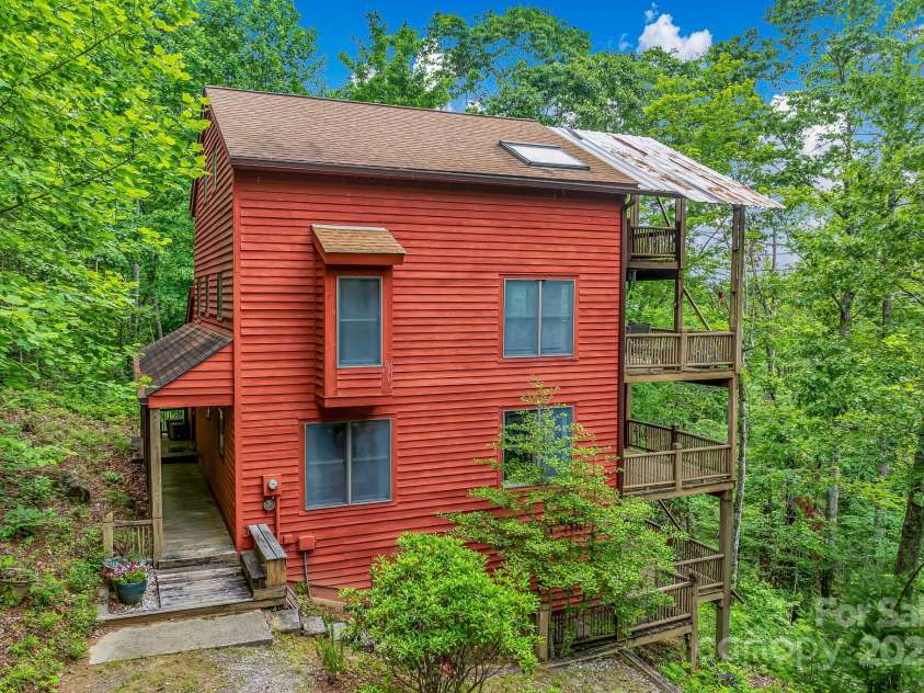 214 Laurel Mountain Trail, Saluda, NC 28773.  MLS# CAR4259688, YatesRealty ID 18449. Just wait for the winter views to appear!