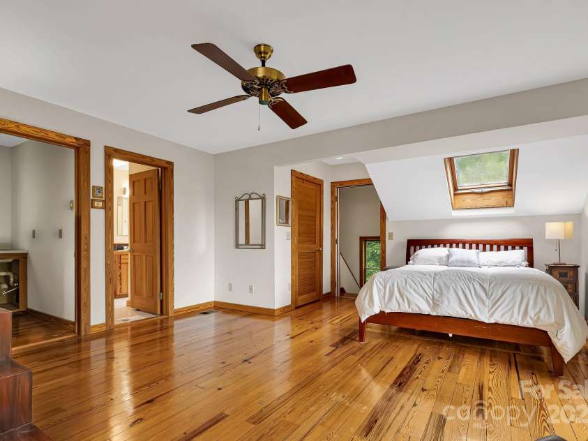 214 Laurel Mountain Trail, Saluda, NC 28773.  MLS# CAR4259688, YatesRealty ID 18449. Multiple skylights let in light during the day and allow for stargazing at night.