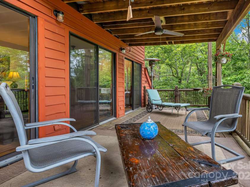 214 Laurel Mountain Trail, Saluda, NC 28773.  MLS# CAR4259688, YatesRealty ID 18449. Stay protected from the elements while enjoying the beauty and sounds of nature.