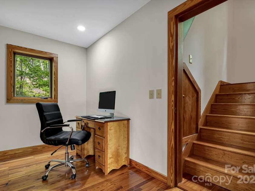 214 Laurel Mountain Trail, Saluda, NC 28773.  MLS# CAR4259688, YatesRealty ID 18449. Storage space abounds in this house from the many closets to the nooks tucked into the stairwells.