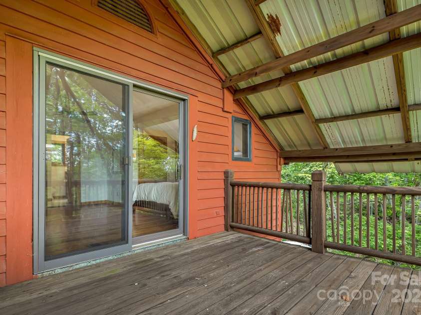 214 Laurel Mountain Trail, Saluda, NC 28773.  MLS# CAR4259688, YatesRealty ID 18449. These windows need no curtains!
