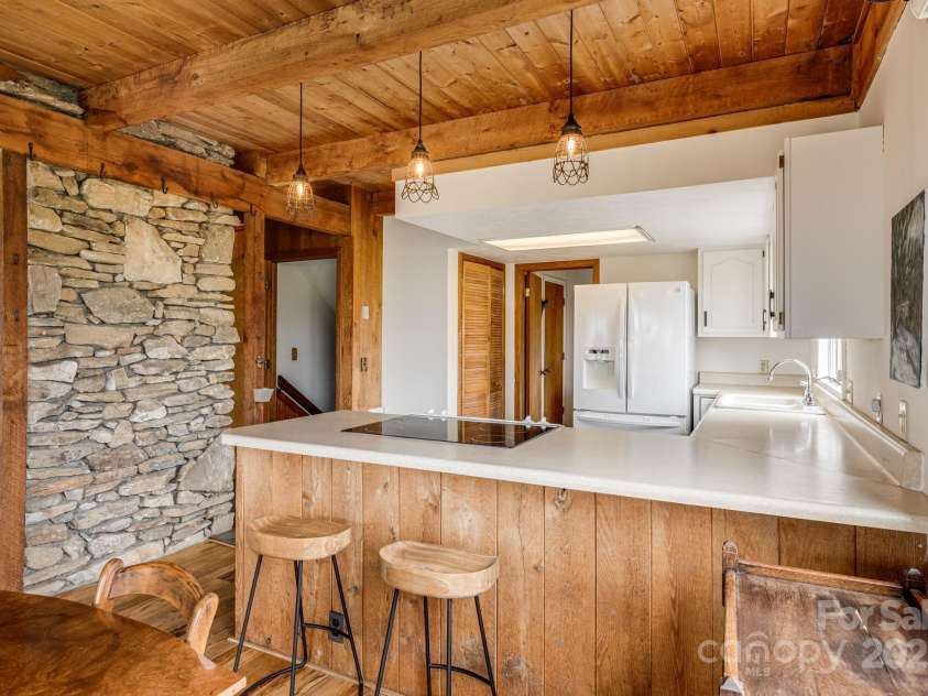 736 Banks Mountain Drive, Hendersonville, NC 28792.  MLS# CAR4253465, YatesRealty ID 18451. 