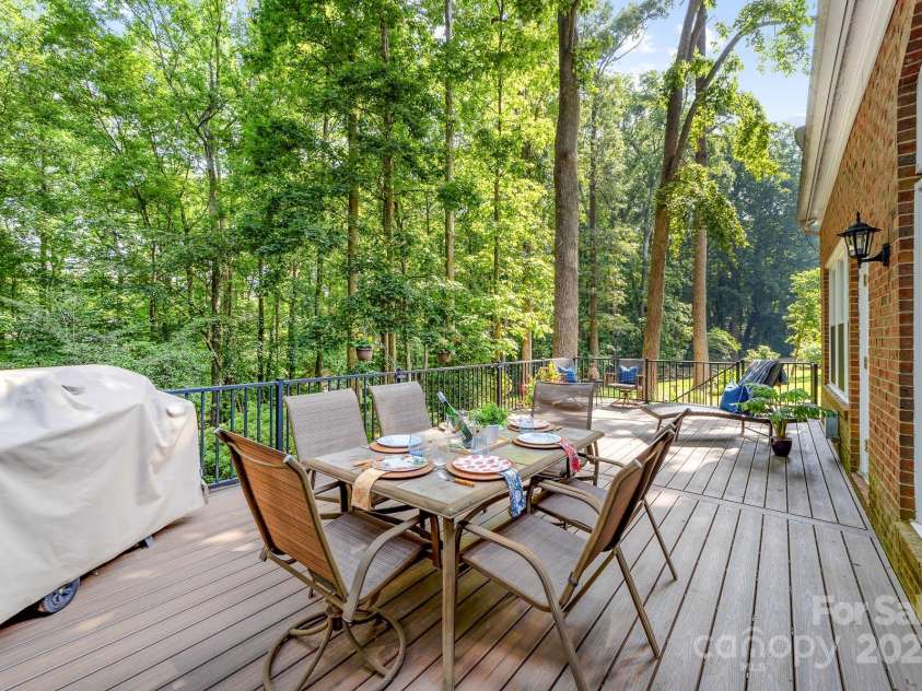 122 Waterford Drive, Mooresville, NC 28117.  MLS# CAR4260054, YatesRealty ID 18454. Deck made for entertaining