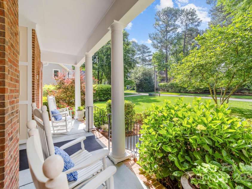 122 Waterford Drive, Mooresville, NC 28117.  MLS# CAR4260054, YatesRealty ID 18454. Enjoy rocking on your covered front porch
