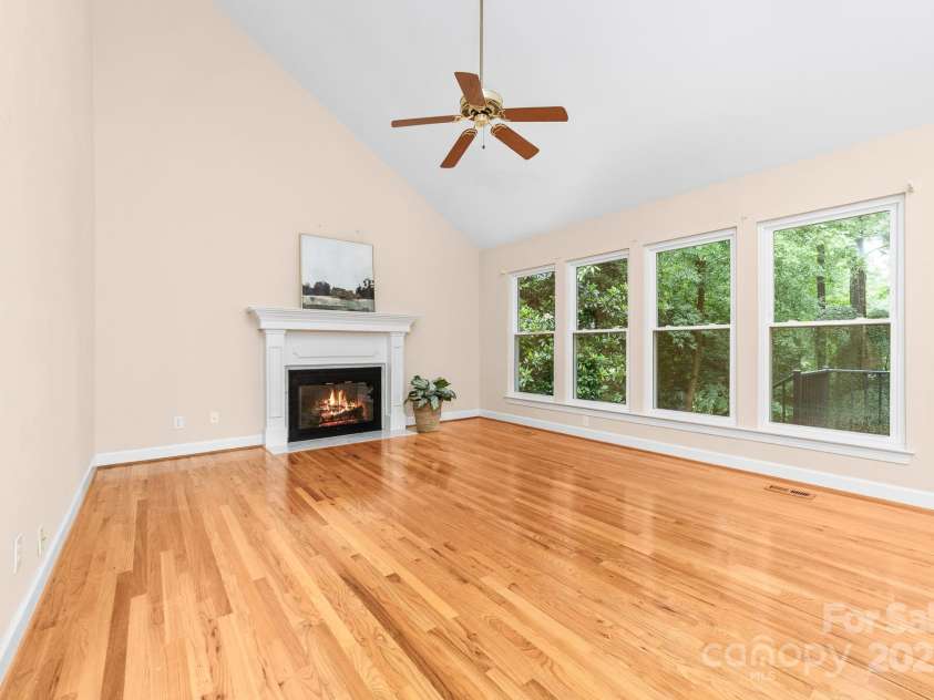 122 Waterford Drive, Mooresville, NC 28117.  MLS# CAR4260054, YatesRealty ID 18454. Hearth Room with wall of windows