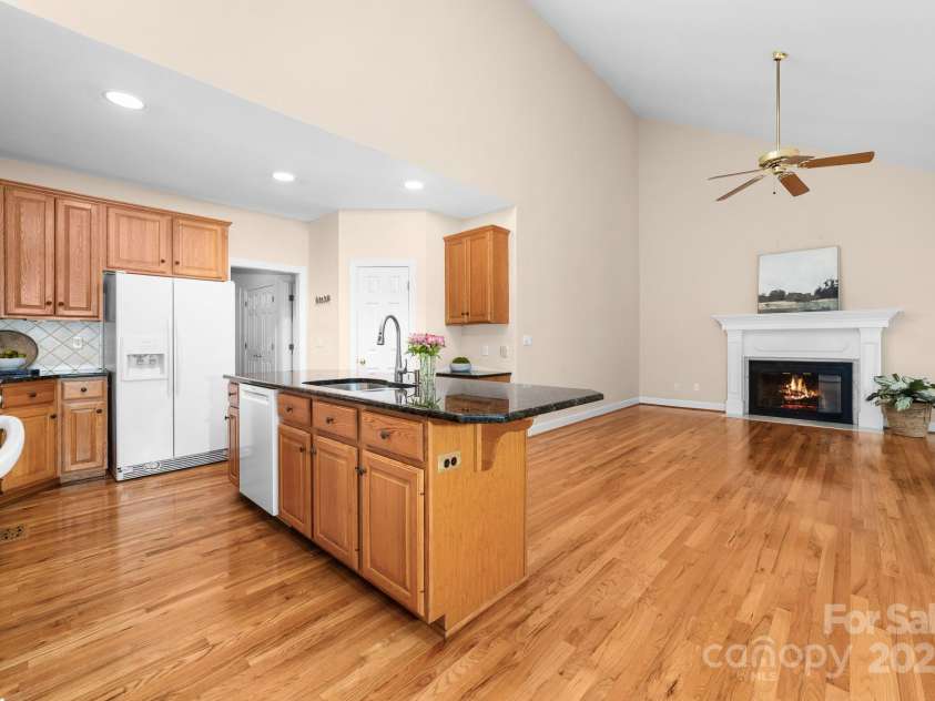122 Waterford Drive, Mooresville, NC 28117.  MLS# CAR4260054, YatesRealty ID 18454. Kitchen open to Hearth Room