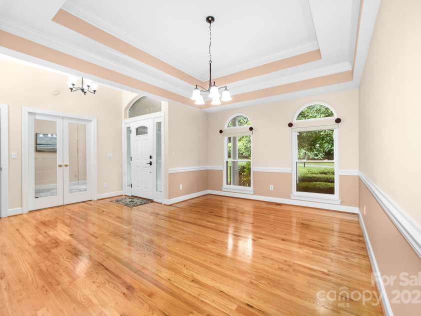 122 Waterford Drive, Mooresville, NC 28117.  MLS# CAR4260054, YatesRealty ID 18454. Large Dining Room open to Great Room