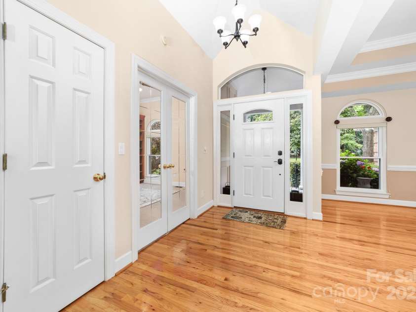 122 Waterford Drive, Mooresville, NC 28117.  MLS# CAR4260054, YatesRealty ID 18454. Lovely entry with convenient Dining Area to the right