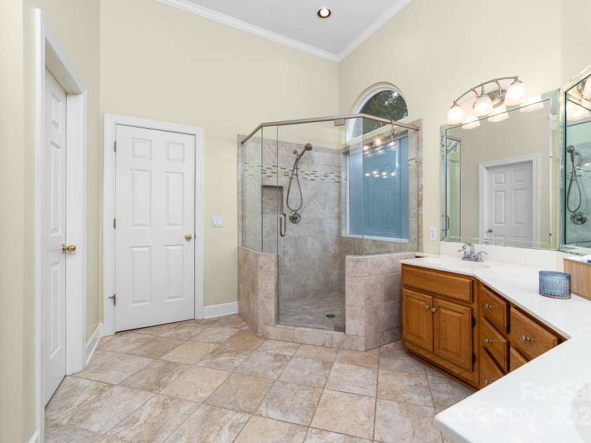 122 Waterford Drive, Mooresville, NC 28117.  MLS# CAR4260054, YatesRealty ID 18454. Primary Bath with updated shower