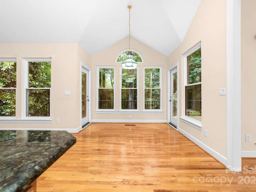 122 Waterford Drive, Mooresville, NC 28117.  MLS# CAR4260054, YatesRealty ID 18454. Window filled Kitchen nook