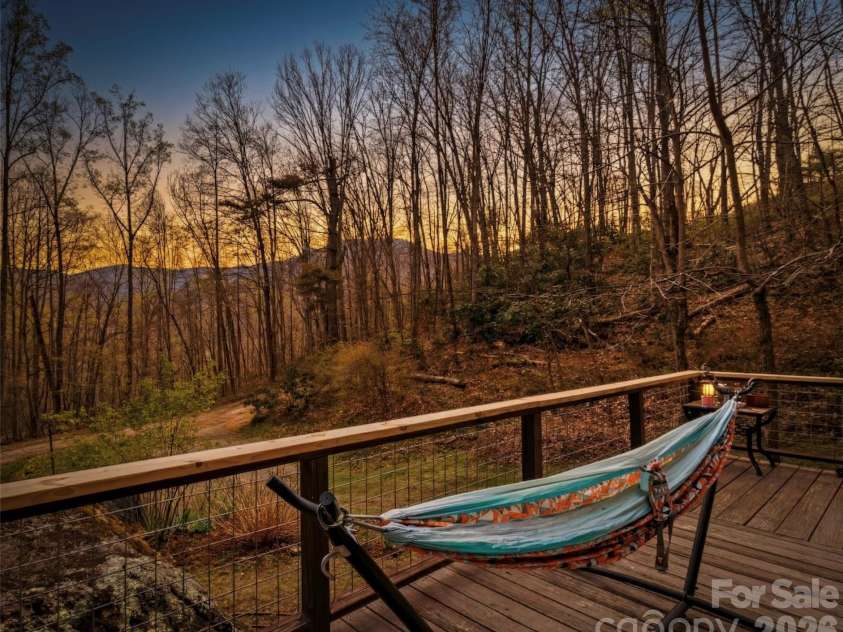 183 Stoney Fork Road, Barnardsville, NC 28709.  MLS# CAR4368859, YatesRealty ID 18455. Sunrise image (AI)