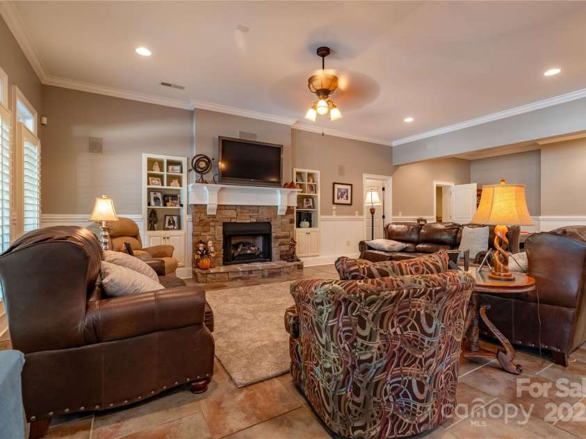 1427 Merrimont Avenue, Kings Mountain, NC 28086.  MLS# CAR4312832, YatesRealty ID 1846. Living Room in Basement