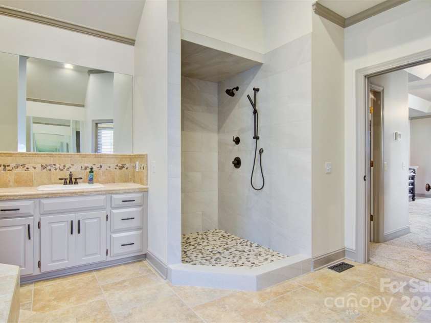 2425 Birdie Lane, Conover, NC 28613.  MLS# CAR4204810, YatesRealty ID 1846. Tile shower redone 2024