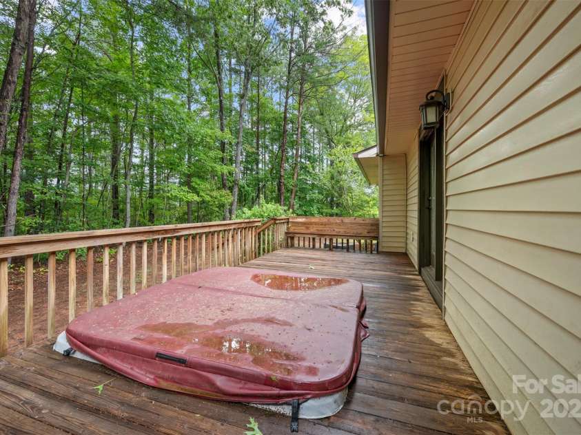307 Owl Hollow Road, Mill Spring, NC 28756.  MLS# CAR4292515, YatesRealty ID 1846. Back Deck. Hot Tub does not work.