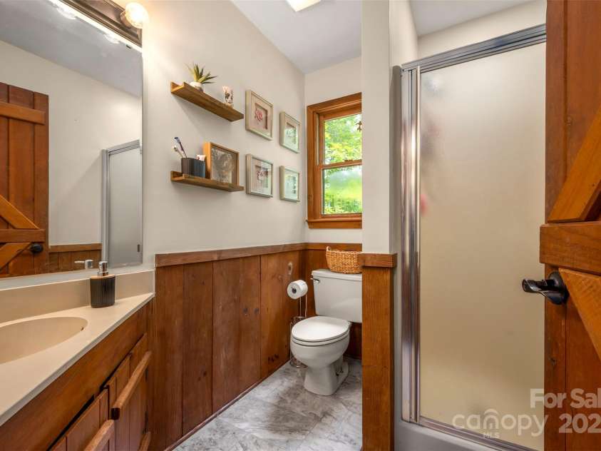 307 Owl Hollow Road, Mill Spring, NC 28756.  MLS# CAR4292515, YatesRealty ID 1846. Guest Bath