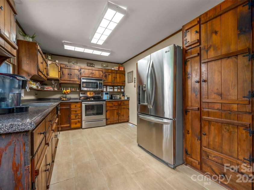 307 Owl Hollow Road, Mill Spring, NC 28756.  MLS# CAR4292515, YatesRealty ID 1846. Kitchen