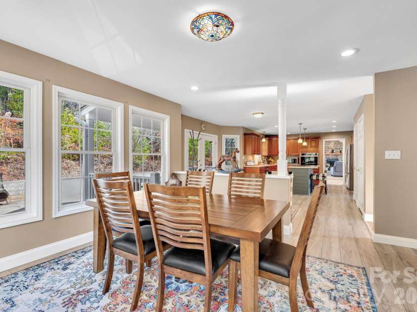 65 Lawson Ridge Road, Leicester, NC 28748.  MLS# CAR4352526, YatesRealty ID 18460. Dining room open layout