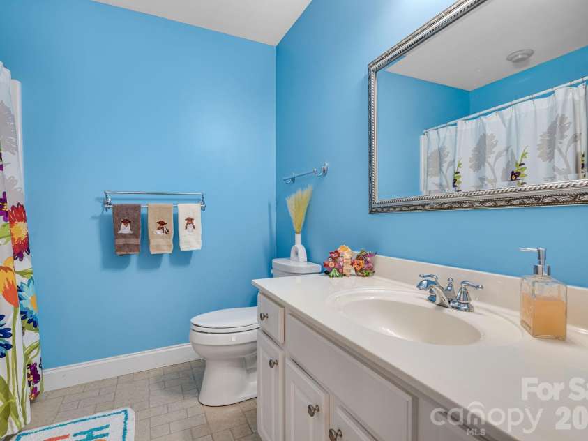 65 Lawson Ridge Road, Leicester, NC 28748.  MLS# CAR4352526, YatesRealty ID 18460. Guest bathroom
