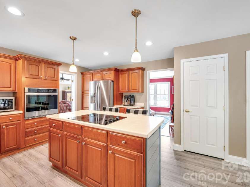 65 Lawson Ridge Road, Leicester, NC 28748.  MLS# CAR4352526, YatesRealty ID 18460. Kitchen island open concept