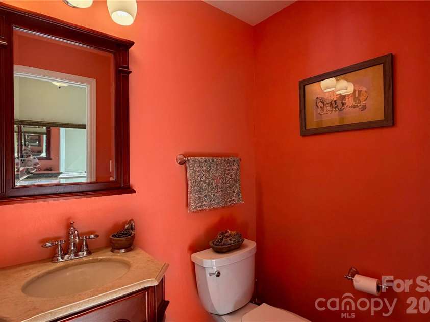 65 Lawson Ridge Road, Leicester, NC 28748.  MLS# CAR4352526, YatesRealty ID 18460. Main Level Half Bath