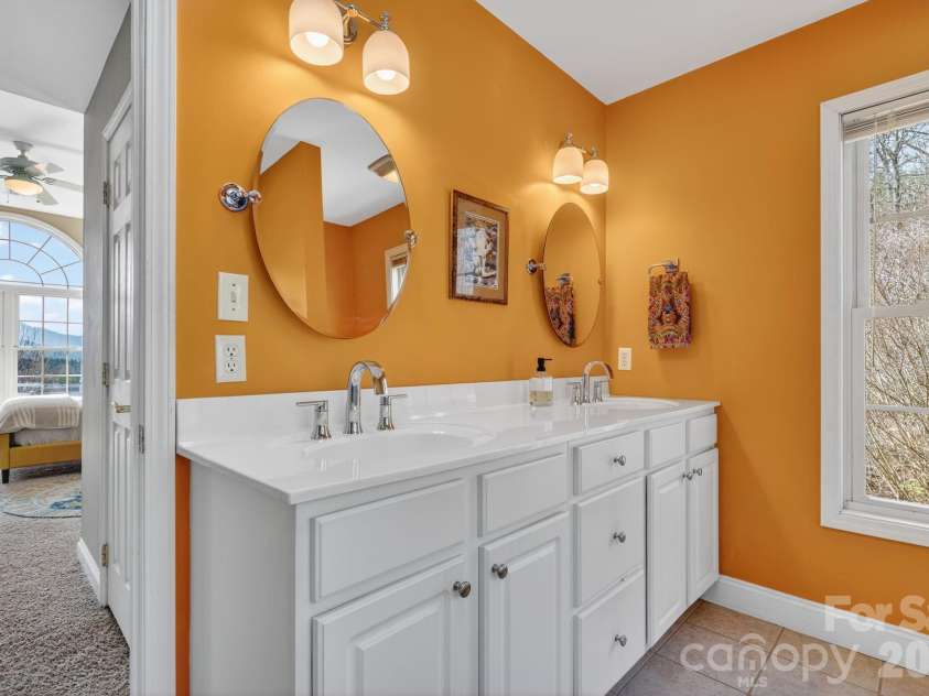 65 Lawson Ridge Road, Leicester, NC 28748.  MLS# CAR4352526, YatesRealty ID 18460. Primary bathroom double vanity