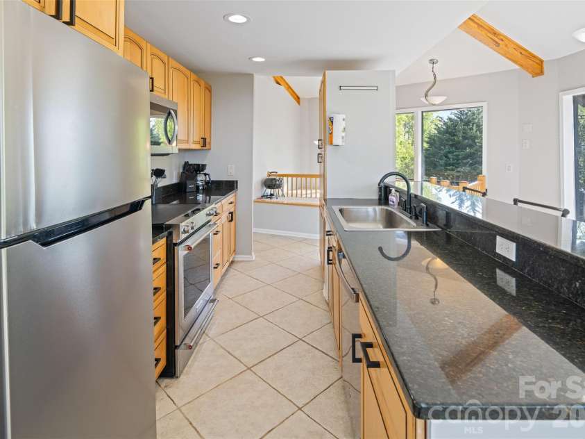 146 Cherokee Lane, Purlear, NC 28665.  MLS# CAR4374878, YatesRealty ID 18468. 