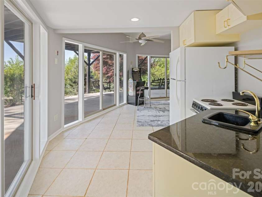 146 Cherokee Lane, Purlear, NC 28665.  MLS# CAR4374878, YatesRealty ID 18468. Lower Level Efficiency with Kitchenette