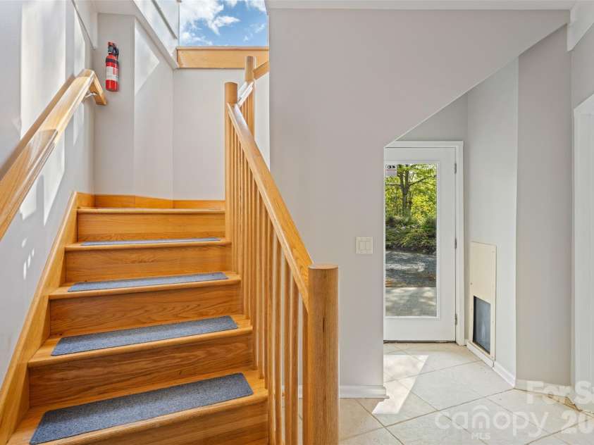 146 Cherokee Lane, Purlear, NC 28665.  MLS# CAR4374878, YatesRealty ID 18468. Lower Level Entrance
