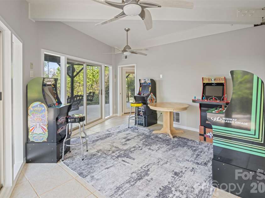 146 Cherokee Lane, Purlear, NC 28665.  MLS# CAR4374878, YatesRealty ID 18468. Lower Level Game Room (Bedroom) with Ensuite Bathroom