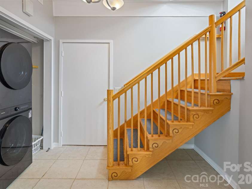 146 Cherokee Lane, Purlear, NC 28665.  MLS# CAR4374878, YatesRealty ID 18468. Lower Level Laundry and door to Garage