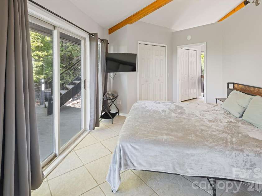 146 Cherokee Lane, Purlear, NC 28665.  MLS# CAR4374878, YatesRealty ID 18468. Main Level Guest Bedroom