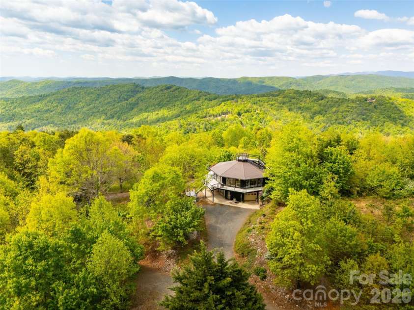 146 Cherokee Lane, Purlear, NC 28665.  MLS# CAR4374878, YatesRealty ID 18468. Round House with Sweeping Long Range Views