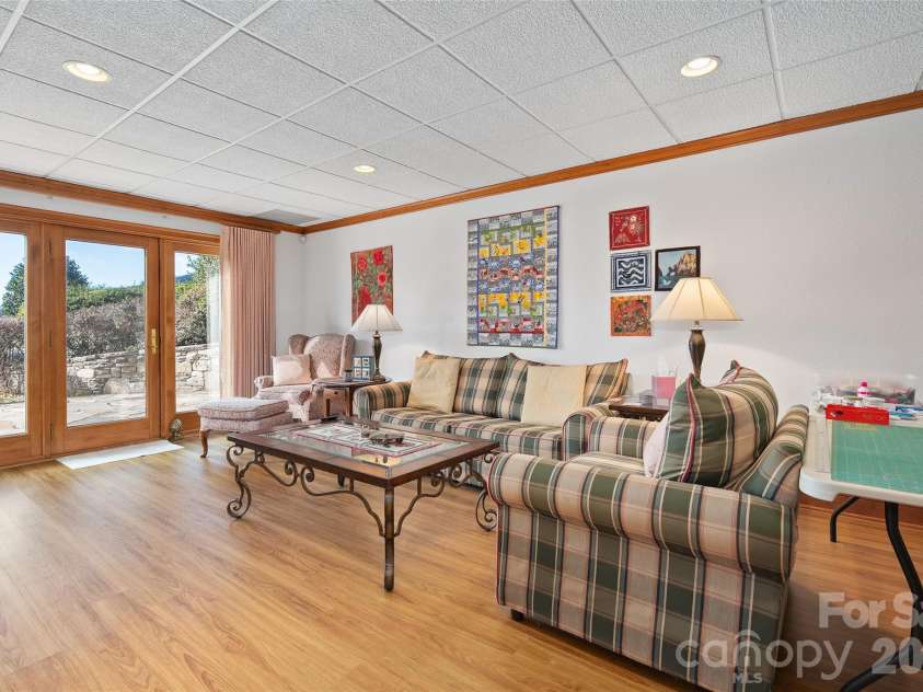 78 Banker Drive, Waynesville, NC 28786.  MLS# CAR4375828, YatesRealty ID 18469. Lower level multi-use space